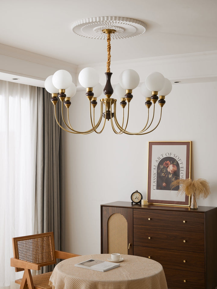 Eiruella lampadario Bracci in ottone globi in vetro Smerigliato