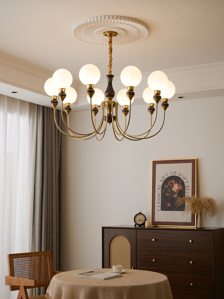 Eiruella lampadario Bracci in ottone globi in vetro Smerigliato