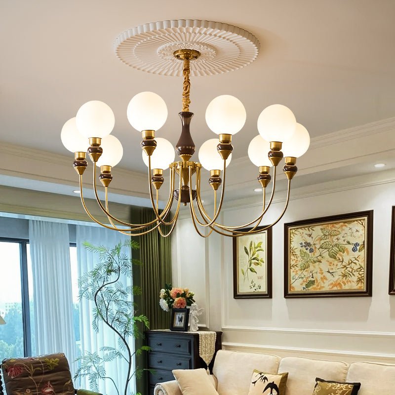 Eiruella lampadario Bracci in ottone globi in vetro Smerigliato