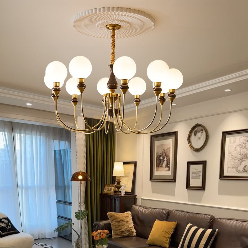 Eiruella lampadario Bracci in ottone globi in vetro Smerigliato
