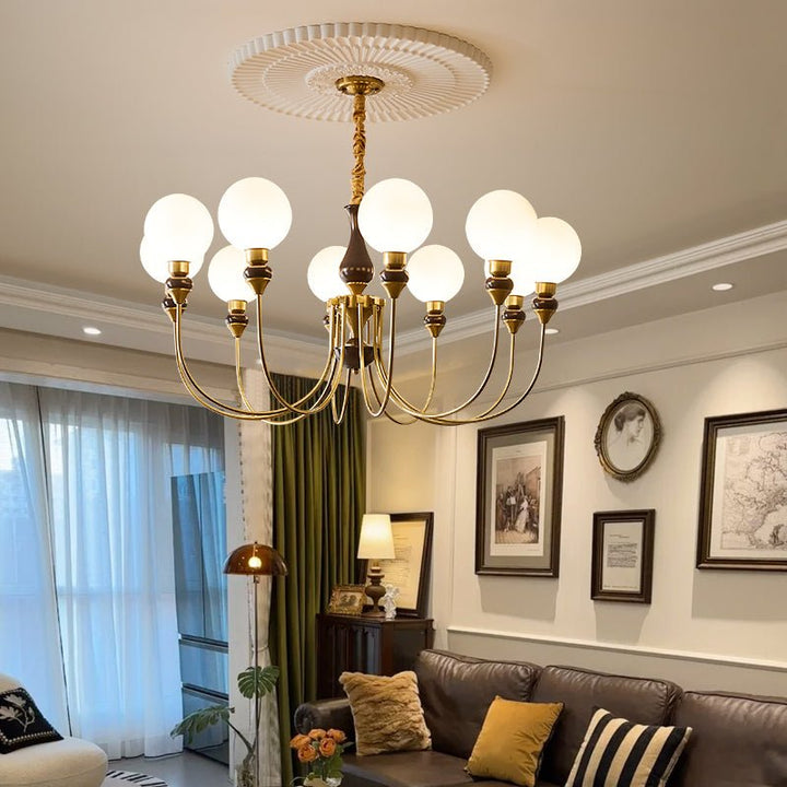 Eiruella lampadario Bracci in ottone globi in vetro Smerigliato