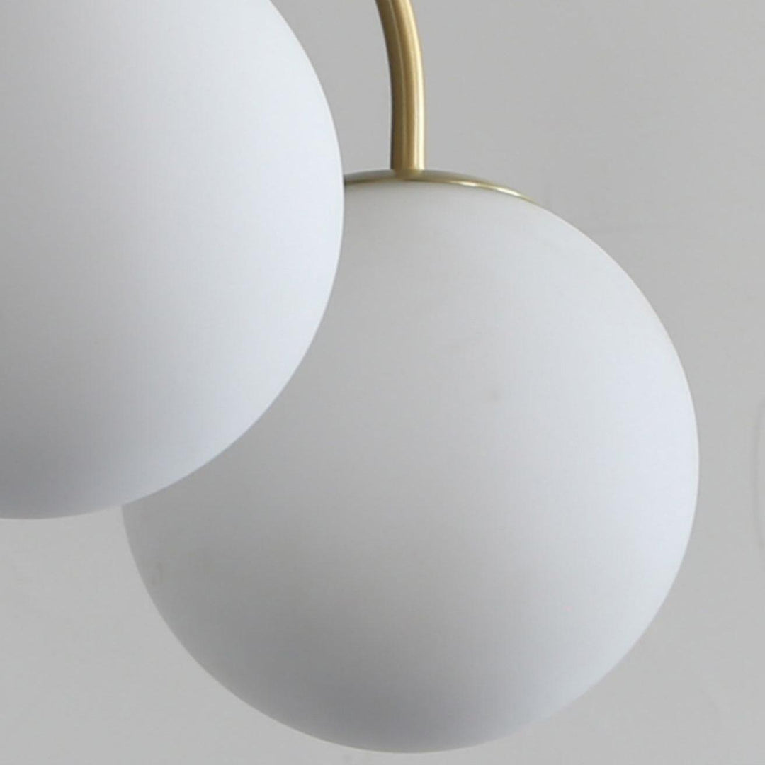 Solalissa lampadario Orillia ottone sfera Globale moderno