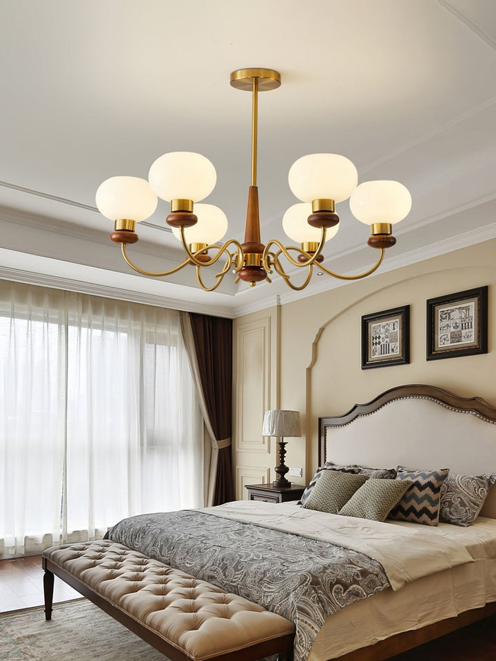 Riniena lampadario in ottone e legno con globo classico
